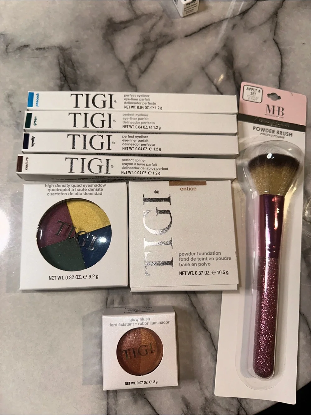 TIGI eyeshadow pallet,3 eyeliners,1 lipliner,glow blush, blush brush,foudation